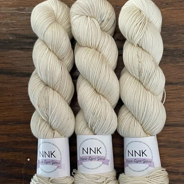 Shell - NNK Fingering weight 4 ply Merino Silk Cashmere. Perfect for garments, accessories, shawls, wraps, scarves. Knitting and crochet. Learn to knit and learn to crochet with this luxury yarn.