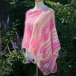 Flamingle Wrap Poncho knitting project by Cally Monster, showing textured stitch pattern and airy fabric