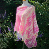 Flamingle Wrap Poncho knitting project by Cally Monster, showing textured stitch pattern and airy fabric