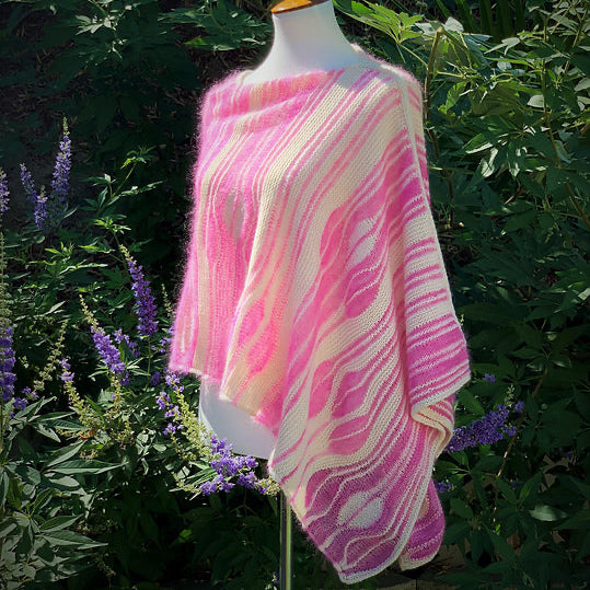 Flamingle Wrap Poncho knitting project by Cally Monster, showing textured stitch pattern and airy fabric
