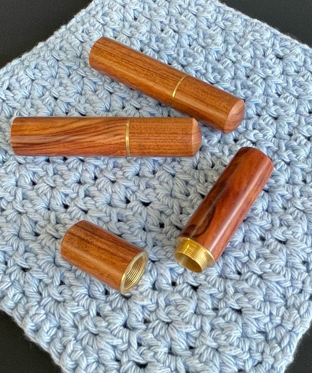 A polished timber darning wool needle case.  With screw on lid.  Perfect for all knitting, sewing, quilting and crochet projects.