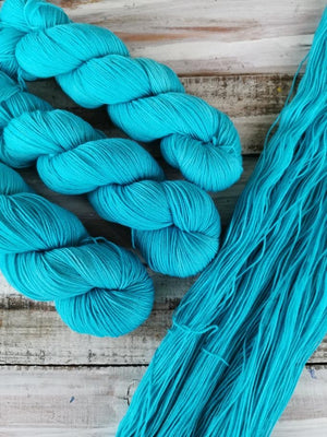Opalescent - NNK Fingering weight 4 ply Merino Silk Cashmere.  Perfect for garments, accessories, shawls, wraps, scarves. Knitting and crochet.  Learn to knit and learn to crochet with this luxury yarn.