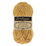 Scheepjes Stonewashed cotton acrylic blend yarn in 809 Yellow Jasper. Available online or in store at Samford Valley yarn shop. Yarn suitable for crochet and knitting patterns. Sport weight yarn in a range of colours. Learn to knit or crochet with us. Make garments, baby blankets, amigurumi, mosaic crochet with Scheepjes Stone Washed. Perfect yarn for Mobius Girl Marguerite blanket and Attic 24 ripple blanket.