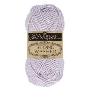 Scheepjes Stonewashed cotton acrylic blend yarn in 818 Lilac Quartz. Available online or in store at Samford Valley yarn shop. Yarn suitable for crochet and knitting patterns. Sport weight yarn in a range of colours. Learn to knit or crochet with us. Make garments, baby blankets, amigurumi, mosaic crochet with Scheepjes Stone Washed. Perfect yarn for Mobius Girl Marguerite blanket and Attic 24 ripple blanket.