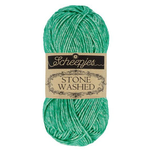 Scheepjes Stonewashed cotton acrylic blend yarn in 825 Malachite. Available online or in store at Samford Valley yarn shop. Yarn suitable for crochet and knitting patterns. Sport weight yarn in a range of colours. Learn to knit or crochet with us. Make garments, baby blankets, amigurumi, mosaic crochet with Scheepjes Stone Washed. Perfect yarn for Mobius Girl Marguerite blanket and Attic 24 ripple blanket.