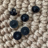 Black button eyes