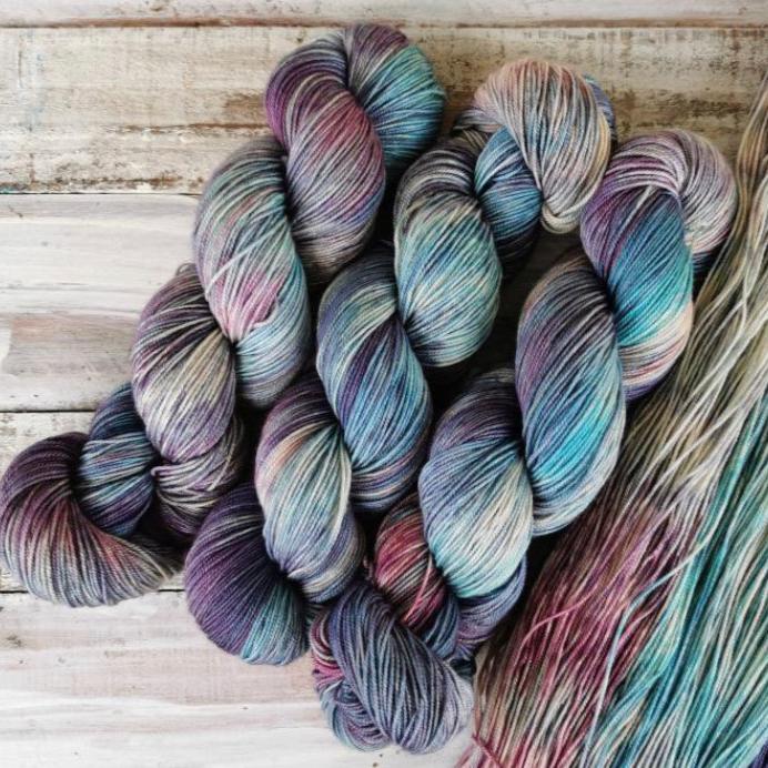 Oil Slick - NNK Fingering weight 4 ply Merino Silk Cashmere.  Perfect for garments, accessories, shawls, wraps, scarves. Knitting and crochet.  Learn to knit and learn to crochet with this luxury yarn.